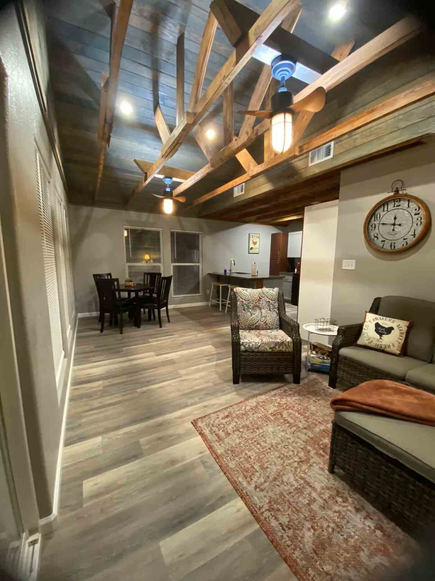 living area view with beams